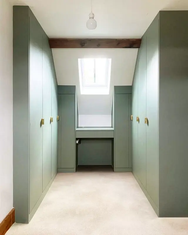 ⭐ Tranquil Sage Green Angled Wardrobes ⭐

Bring a sense of calm to any space with our range of green tones. This angled wardrobe beautifully complements the customer's loft room, featuring refined half-moon brass handles. It frames a Velux window perfectly and is paired with two aligned wardrobes and a sleek dressing table below, creating a beautifully balanced and serene dressing area.

We always are amazed how the right design can transform a room! 🏠

#luxurydesign #sagegreenaesthetic #bespokefurniture #ElegantLiving #HomeImprovement