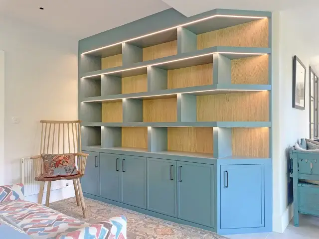 🏠⭐We’ve collaborated with our customer to design a beautiful display unit that breathes new life into this unused corner of their hallway. The furniture features solid ash timber doors painted in 'Blue Gum' by Paint and Paper Library, with a washed limed oak veneer back panel and internal shelves. Dimmable LED strip lights add the finishing touch, combining style and function seamlessly!⭐🏠